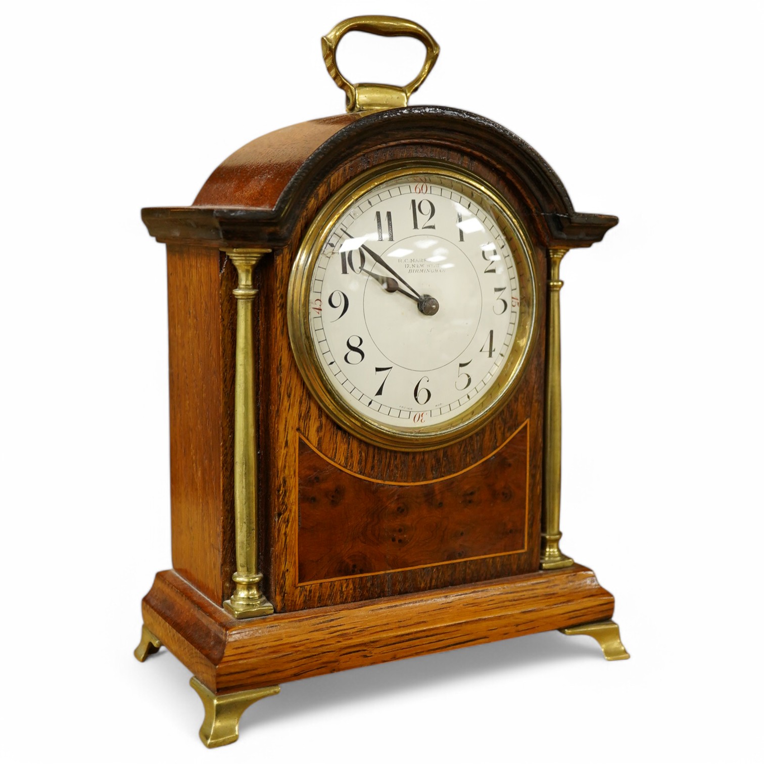 An Edwardian inlaid mantel timepiece, R. C. Marsh, Birmingham, 24cm high. Condition - poor/fair, glass cracked